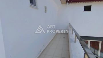 Дуплекс 3+1 с видом на море в Махмутларе, 150 кв.м. - Ракурс 38