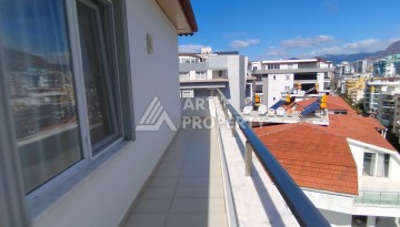 Дуплекс 3+1 с видом на море в Махмутларе, 150 кв.м. - Ракурс 45