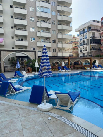 Квартира с мебелью в центральной части Махмутлара в комплексе с развитой инфраструктурой, 70 м2 - Ракурс 6