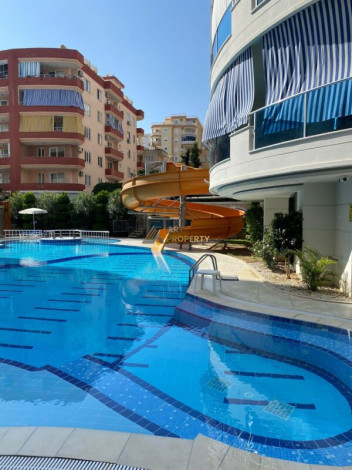 Квартира с мебелью в центральной части Махмутлара в комплексе с развитой инфраструктурой, 70 м2 - Ракурс 9