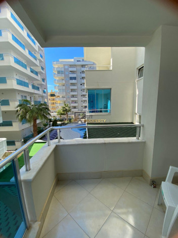 Квартира с мебелью в центральной части Махмутлара в комплексе с развитой инфраструктурой, 70 м2 - Ракурс 15