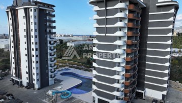 Меблированная студия 35 м² с панорамным видом на горы в современном комплексе Махмутлара - Ракурс 2