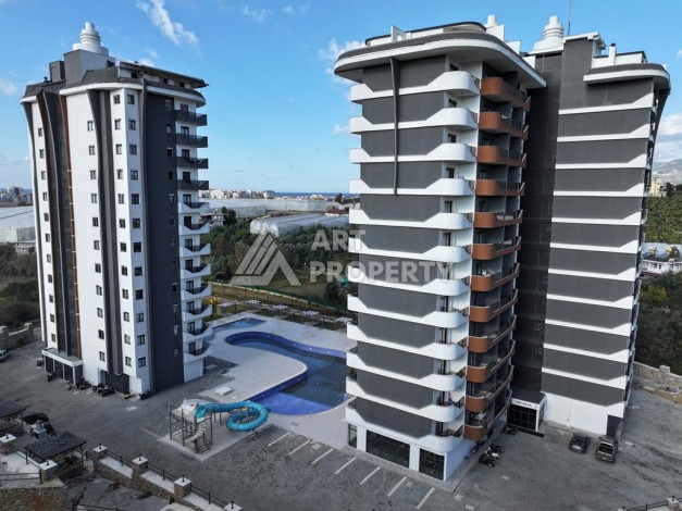 Меблированная студия 35 м² с панорамным видом на горы в современном комплексе Махмутлара - Ракурс 1