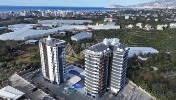 Меблированная студия 35 м² с панорамным видом на горы в современном комплексе Махмутлара - Ракурс 4