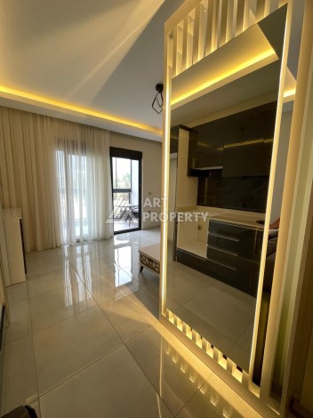 Меблированная студия 35 м² с панорамным видом на горы в современном комплексе Махмутлара - Ракурс 5