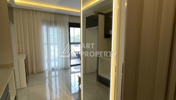 Меблированная студия 35 м² с панорамным видом на горы в современном комплексе Махмутлара - Ракурс 11