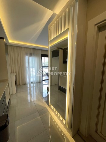 Меблированная студия 35 м² с панорамным видом на горы в современном комплексе Махмутлара - Ракурс 10