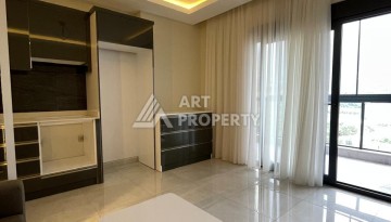 Меблированная студия 35 м² с панорамным видом на горы в современном комплексе Махмутлара - Ракурс 12