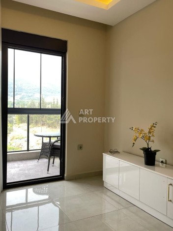 Меблированная студия 35 м² с панорамным видом на горы в современном комплексе Махмутлара - Ракурс 12