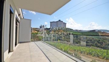 Современная вилла 3+1 с личным бассейном и панорамным видом на море в Каргыджаке - Ракурс 17