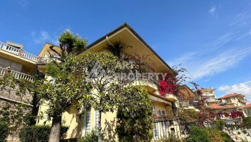 Вилла 3+1 в легендарном комплексе Gold City с панорамным видом на море и доступом к отельной инфраструктуре - Ракурс 1