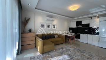 Квартира 1+1 с мебелью в Авсалларе, 60 кв.м. Элитная недвижимость в Алании - Ракурс 24