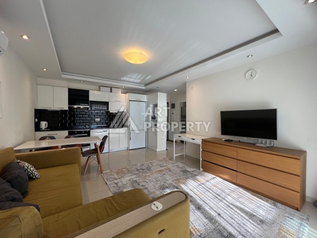 Квартира 1+1 с мебелью в Авсалларе, 60 кв.м. Элитная недвижимость в Алании - Ракурс 24