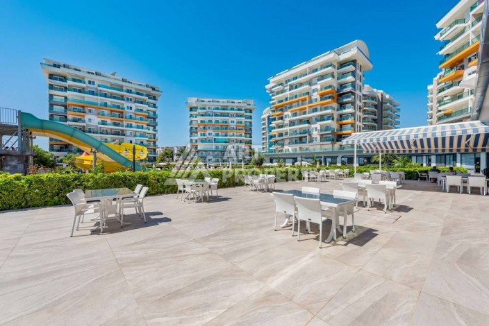 Квартира 1+1 в Авсалларе с панорамным балконом, 65 кв.м. - Ракурс 1