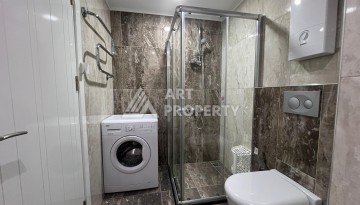 Квартира 1+1 в Авсалларе с панорамным балконом, 65 кв.м. - Ракурс 34