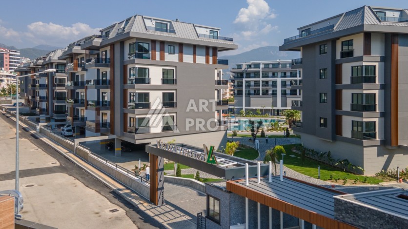 Дизайнерская квартира 1+1 в элитной резиденции, 55 кв.м. Оба, Алания - Ракурс 4