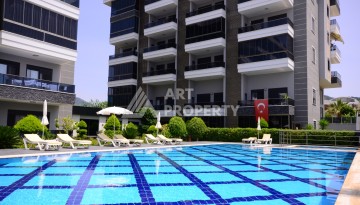 Двухуровневая квартира 2+1 с выходом в сад, 300 метров до моря в районе Каргыджак - Ракурс 1