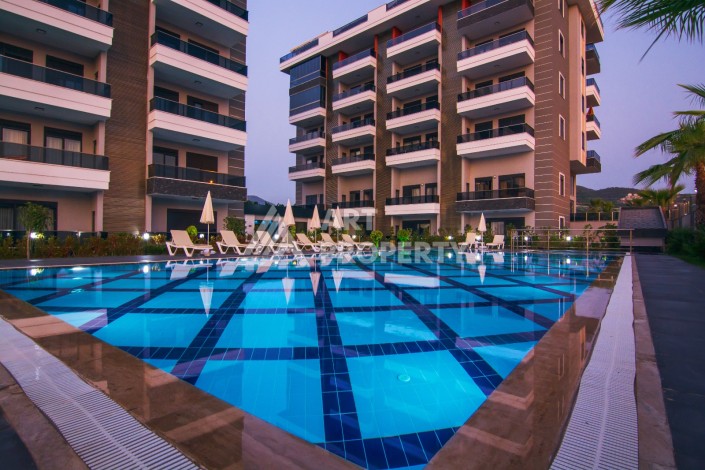 Двухуровневая квартира 2+1 с выходом в сад, 300 метров до моря в районе Каргыджак - Ракурс 1