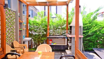 Двухуровневая квартира 2+1 с выходом в сад, 300 метров до моря в районе Каргыджак - Ракурс 3