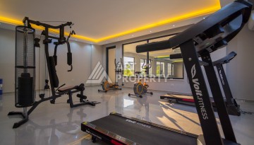 Двухуровневая квартира 2+1 с выходом в сад, 300 метров до моря в районе Каргыджак - Ракурс 5