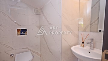 Двухуровневая квартира 2+1 с выходом в сад, 300 метров до моря в районе Каргыджак - Ракурс 8