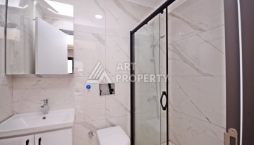 Двухуровневая квартира 2+1 с выходом в сад, 300 метров до моря в районе Каргыджак - Ракурс 9