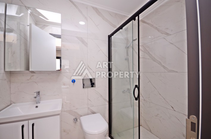 Двухуровневая квартира 2+1 с выходом в сад, 300 метров до моря в районе Каргыджак - Ракурс 8