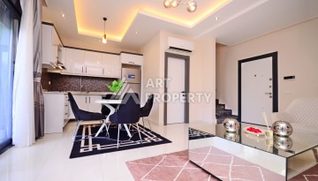 Двухуровневая квартира 2+1 с выходом в сад, 300 метров до моря в районе Каргыджак - Ракурс 11