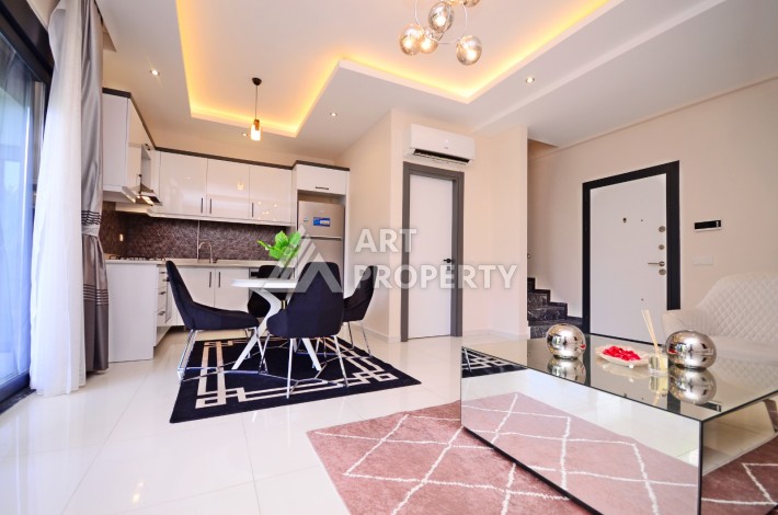 Двухуровневая квартира 2+1 с выходом в сад, 300 метров до моря в районе Каргыджак - Ракурс 10