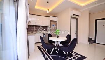 Двухуровневая квартира 2+1 с выходом в сад, 300 метров до моря в районе Каргыджак - Ракурс 12