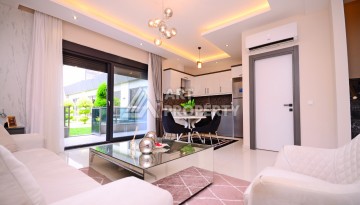 Двухуровневая квартира 2+1 с выходом в сад, 300 метров до моря в районе Каргыджак - Ракурс 13