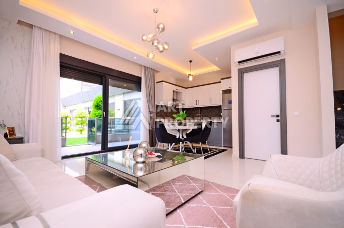 Двухуровневая квартира 2+1 с выходом в сад, 300 метров до моря в районе Каргыджак - Ракурс 12