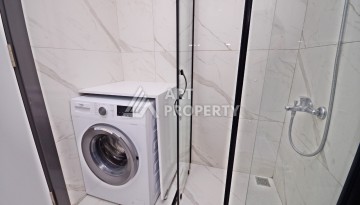 Двухуровневая квартира 2+1 с выходом в сад, 300 метров до моря в районе Каргыджак - Ракурс 14