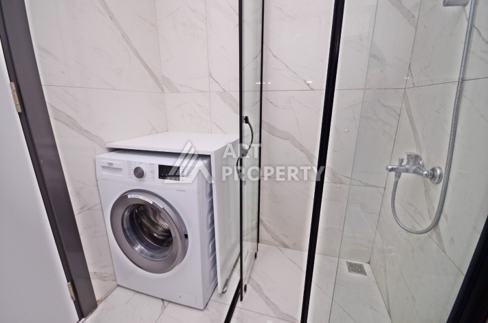 Двухуровневая квартира 2+1 с выходом в сад, 300 метров до моря в районе Каргыджак - Ракурс 13