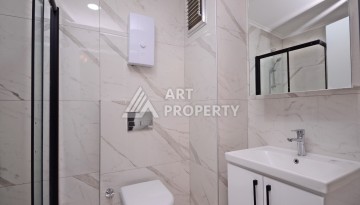 Двухуровневая квартира 2+1 с выходом в сад, 300 метров до моря в районе Каргыджак - Ракурс 15