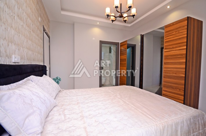 Двухуровневая квартира 2+1 с выходом в сад, 300 метров до моря в районе Каргыджак - Ракурс 15