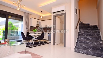 Двухуровневая квартира 2+1 с выходом в сад, 300 метров до моря в районе Каргыджак - Ракурс 17