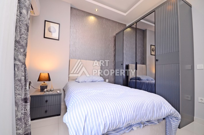 Двухуровневая квартира 2+1 с выходом в сад, 300 метров до моря в районе Каргыджак - Ракурс 17