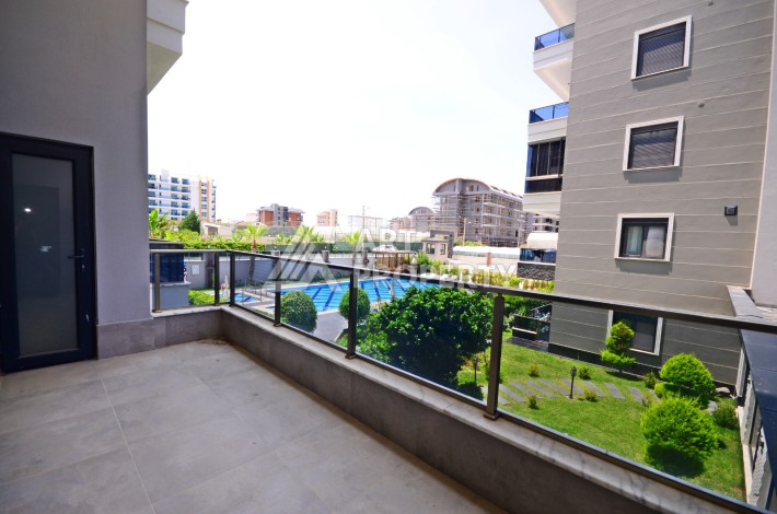 Двухуровневая квартира 2+1 с выходом в сад, 300 метров до моря в районе Каргыджак - Ракурс 19