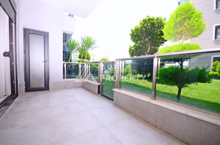 Двухуровневая квартира 2+1 с выходом в сад, 300 метров до моря в районе Каргыджак - Ракурс 20