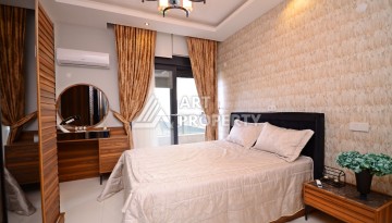 Двухуровневая квартира 2+1 с выходом в сад, 300 метров до моря в районе Каргыджак - Ракурс 22