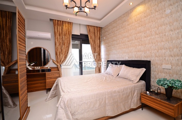 Двухуровневая квартира 2+1 с выходом в сад, 300 метров до моря в районе Каргыджак - Ракурс 21