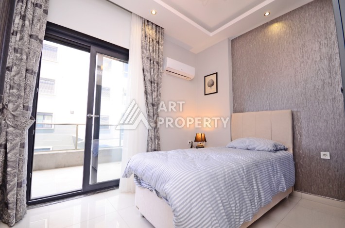 Двухуровневая квартира 2+1 с выходом в сад, 300 метров до моря в районе Каргыджак - Ракурс 23