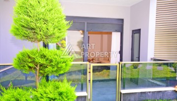 Двухуровневая квартира 2+1 с выходом в сад, 300 метров до моря в районе Каргыджак - Ракурс 25