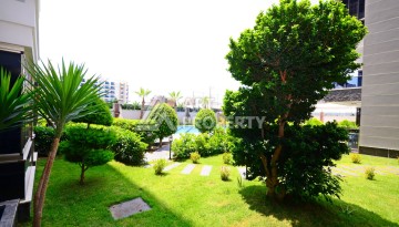 Двухуровневая квартира 2+1 с выходом в сад, 300 метров до моря в районе Каргыджак - Ракурс 26