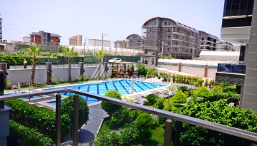 Двухуровневая квартира 2+1 с выходом в сад, 300 метров до моря в районе Каргыджак - Ракурс 27