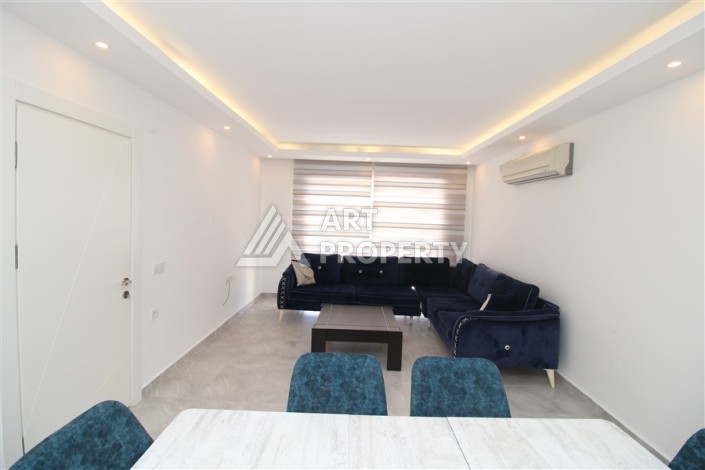 Квартира 2+1 с отдельной кухней в Махмутларе. Всего 400 метров до моря - Ракурс 9