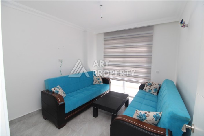 Квартира 2+1 с отдельной кухней в Махмутларе. Всего 400 метров до моря - Ракурс 12