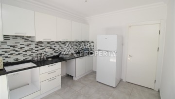 Квартира 2+1 с отдельной кухней в Махмутларе. Всего 400 метров до моря - Ракурс 20