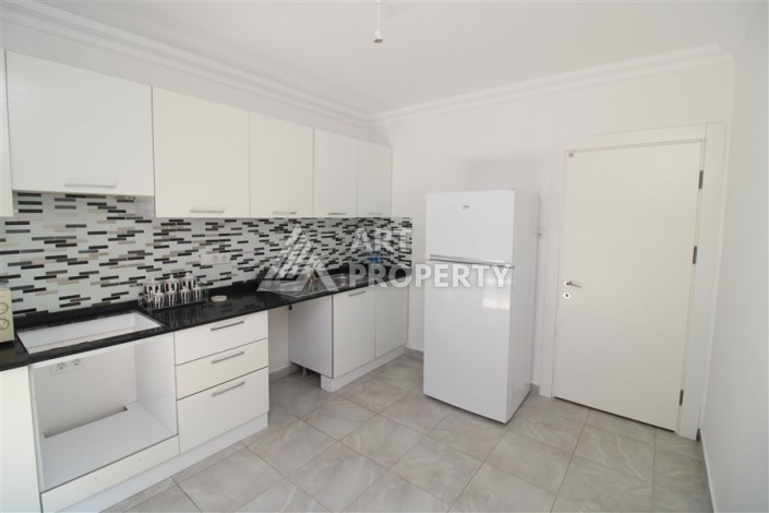 Квартира 2+1 с отдельной кухней в Махмутларе. Всего 400 метров до моря - Ракурс 19